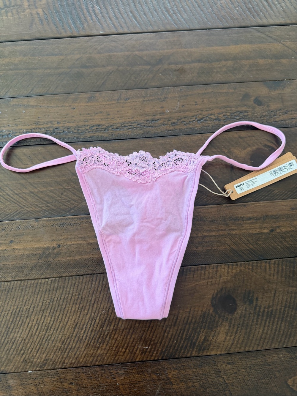 SKIMS Pink Lace-Trim Thong. Fits everybody